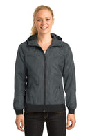 Outerwear Sport-Tek Ladies Embossed Hooded Wind Jacket. LST53 Sport-Tek