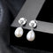 Elegant Women Cute Flower Design Oval Shape Freshwater Pearl Silver Earrings
