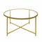 Coffee Tables Round Metal Coffee Table With Glass Top and X Shape Base, Gold and Clear Benzara