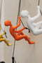 Home Decor DIY Room Decor - 6" x 3" x 3" Resin Orange Climbing Man HomeRoots