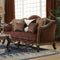 Upholstered Loveseat With Arched Backrest And Five Pillows In Antique Oak Finish