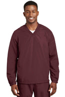 Outerwear Sport-Tek V-Neck Raglan Wind Shirt. JST72 Sport-Tek