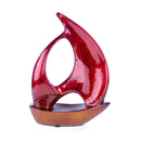 Sculptures Ceramic Sculpture - 9'.5" X 3'.5" X 12'.25" Red, Orange Ceramic Ombre Small Sailboat Sculpture HomeRoots