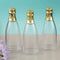 Wedding Candy Buffet Accessories Perfectly Plain Collection champagne bottle acrylic container with gold foil top Fashioncraft