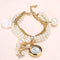 Women Pearls Crystal And Charm Luxury Bracelet Quartz Watch-White 2-JadeMoghul Inc.